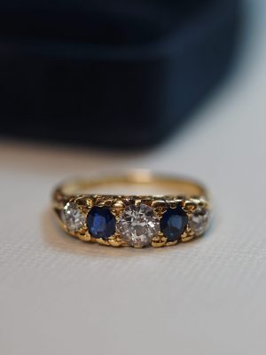 Sapphire Diamond Swirl Engagement Ring Front March 20